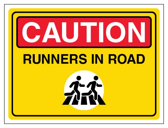Caution Runners In Road Landscape