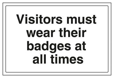 Visitors Must Wear Their Badges At All Times Sign